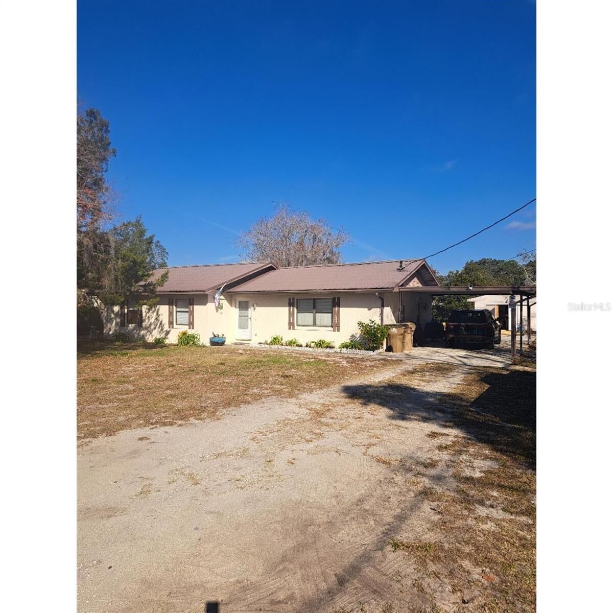 Property Photo:  11301 Huggins Street  FL 34788 