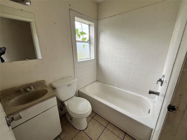 Property Photo: 311 E Magnolia Street 2 FL 34748