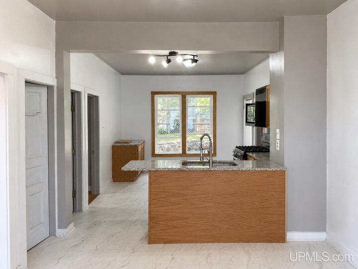 Property Photo:  1105 Minnesota Street  MI 49930 