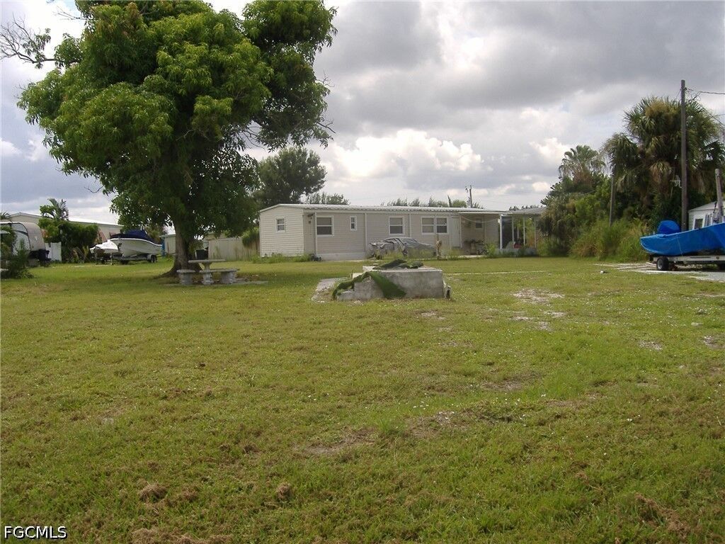 Property Photo: 4873 Sandpiper Drive FL 33956