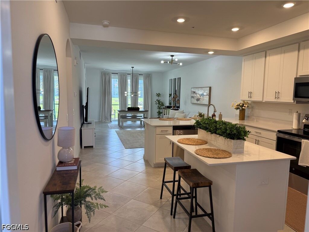 Property Photo: 18421 Copperhead Court N 215 FL 33936