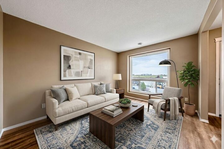 Property Photo:  108 Sunrise Terrace NE  AB T1V 0C2 