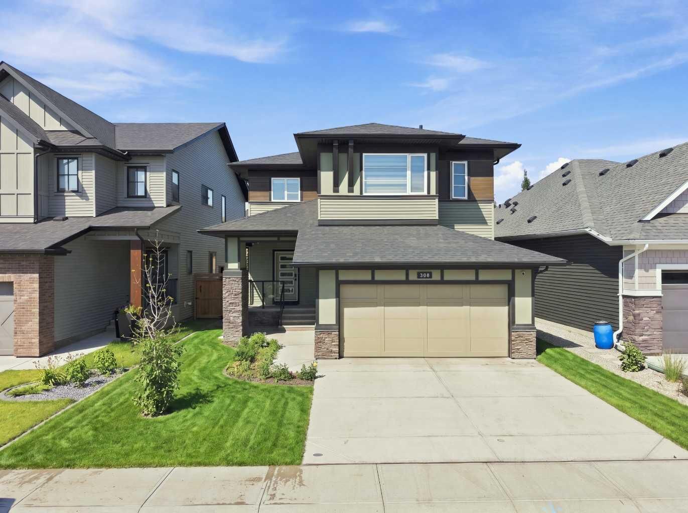 Property Photo: 308 Coopersfield Rise SW AB T4B 4K7