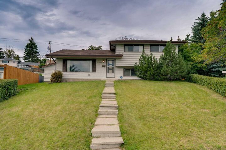Property Photo: 5031 Newcombe Place NW AB T2K 2P6