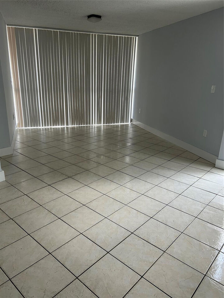 Property Photo:  7035 NW 186th Street D111  FL 33015 