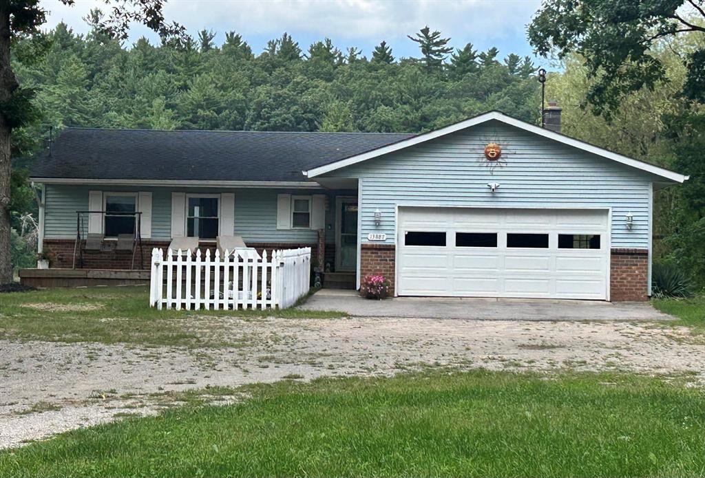 Property Photo:  13887 Keiber Road NE  MI 48838 