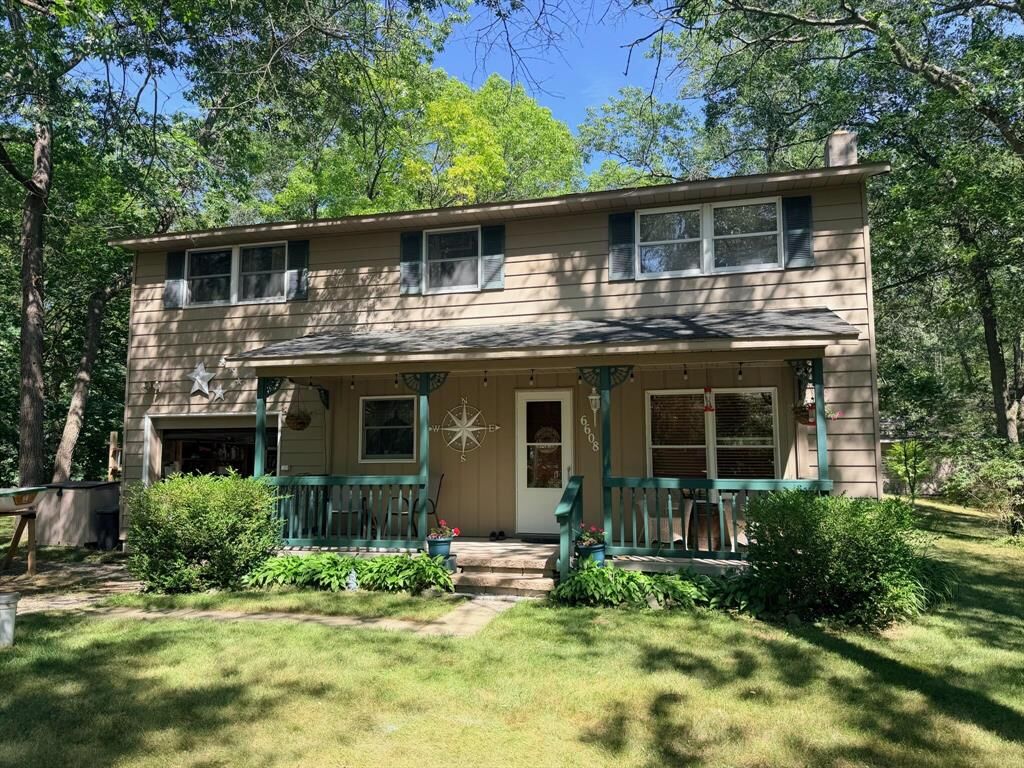 Property Photo:  6608 Sylva Beach Road  MI 48725 