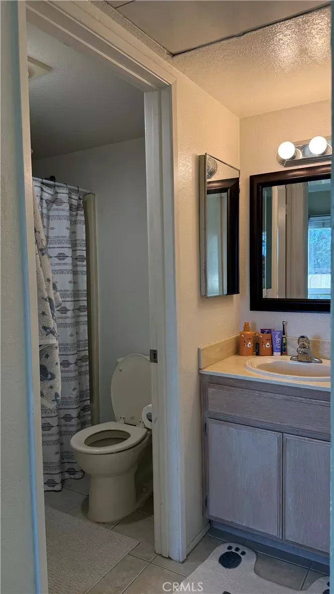 Property Photo:  6131 Calle Mariselda 104  CA 92124 