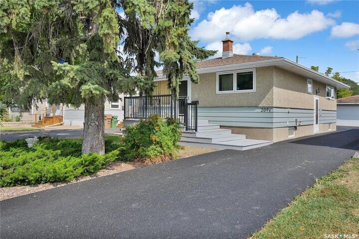 Property Photo:  209 Broad Street N  SK S4R 2X7 