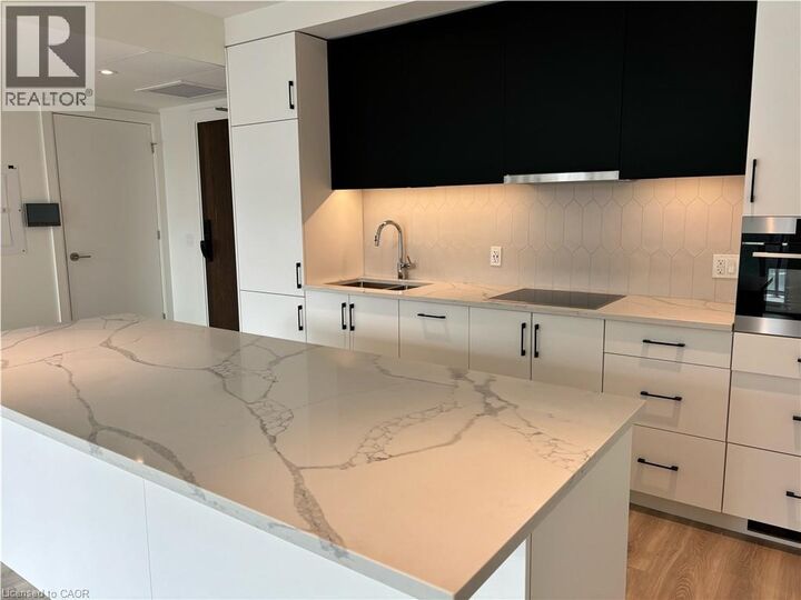 Property Photo: 741 King Street West 104 ON N2G 1E5