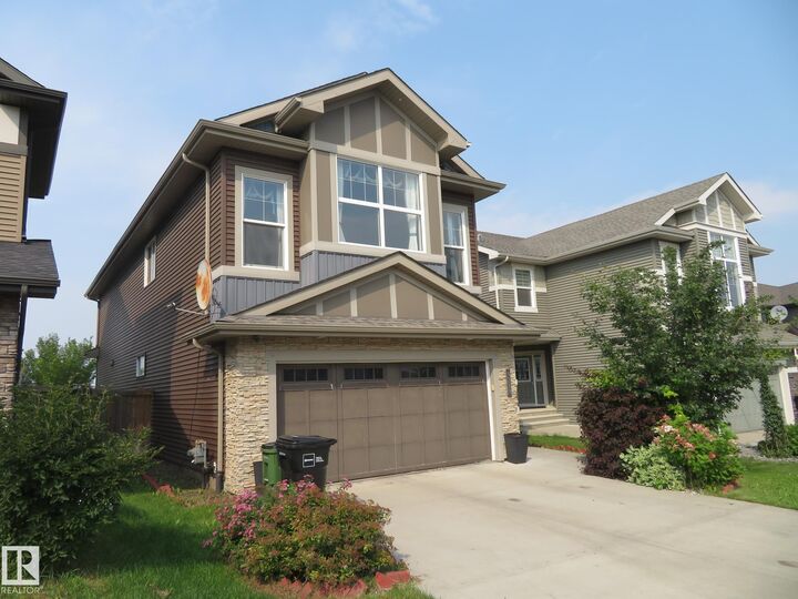 Property Photo: 3233 Winspear Crescent SW AB T6X 1S7