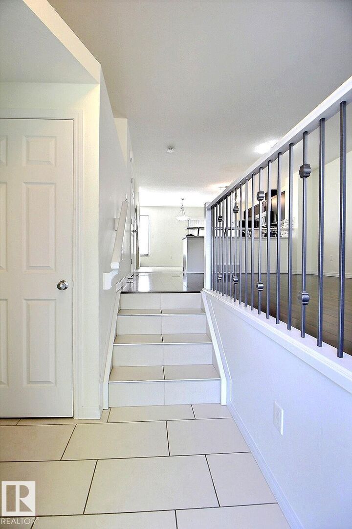 Property Photo:  4850 Terwillegar Common NW 18  AB T6R 0T6 