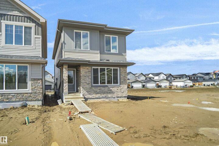 Property Photo:  581 177 Avenue NE  AB T5Y 4K3 