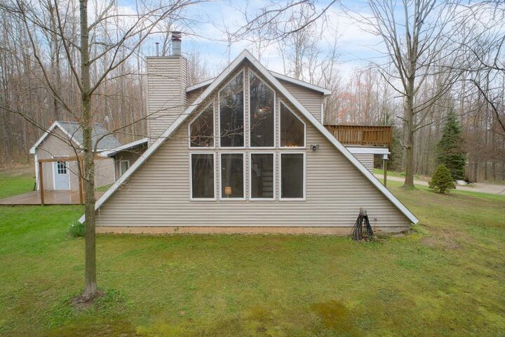 Property Photo:  1180 Winding Wood  MI 48622 