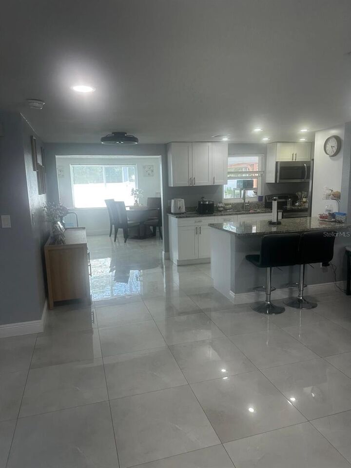 Property Photo:  11719 Enterprise Drive  FL 34668 