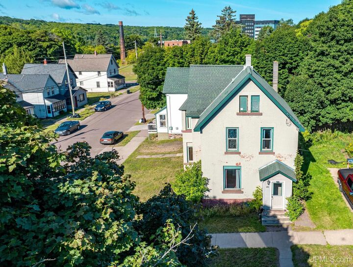 Property Photo:  202 Scallon Street  MI 49930 