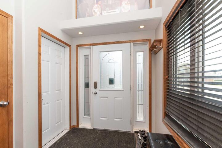 Property Photo: 709 Lynx Landing N AB T1H 0C3