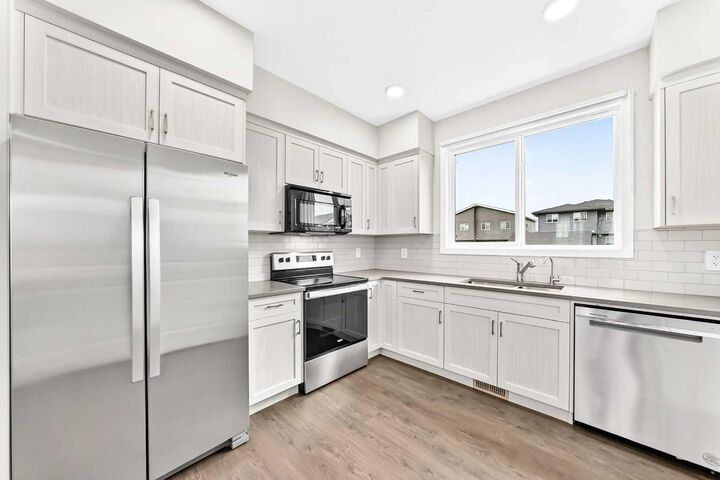 Property Photo: 471 Livingston Way NE AB T3P 1Y5