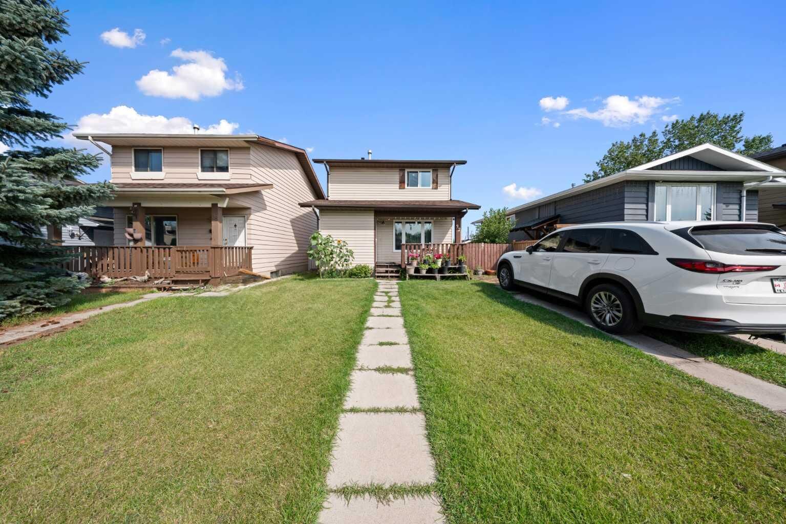Property Photo:  32 Shawmeadows Road SW  AB T2Y 1B2 