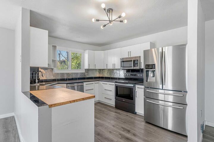 6824 Temple Drive NE — photo 1