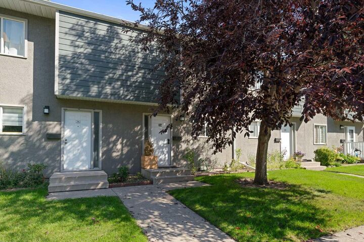 Property Photo:  219 90 Avenue SE 27  AB T2J 0A3 