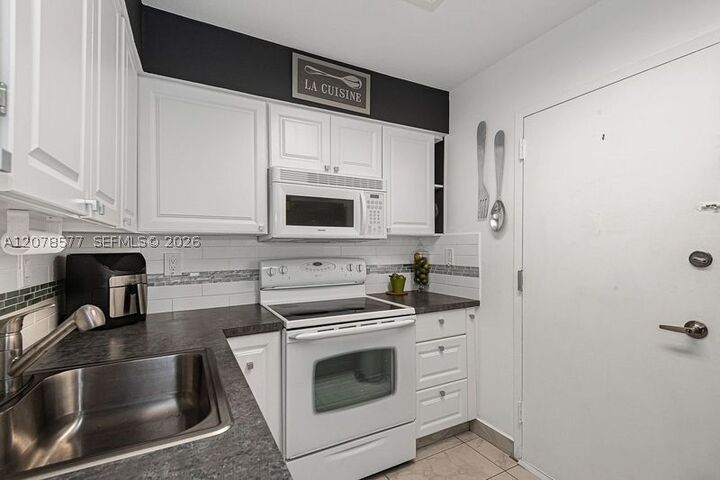 Property Photo:  17800 Atlantic Blvd 203  FL 33160 