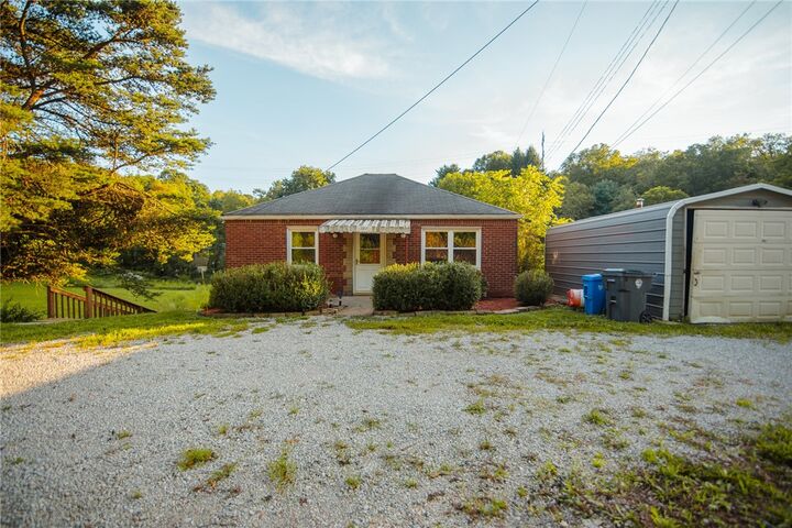 Property Photo:  787 Route 30  PA 15126 