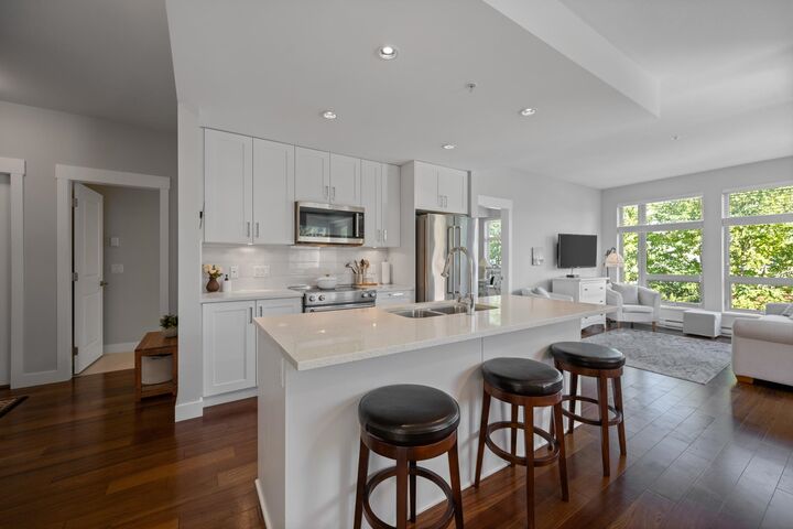 Property Photo: 1166 54A Street 312 BC V4M 4B5