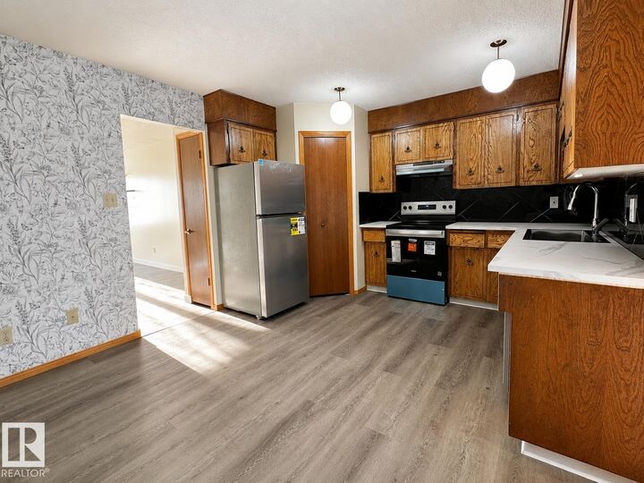 Property Photo:  13110 31 Street NW  AB T5A 3A4 