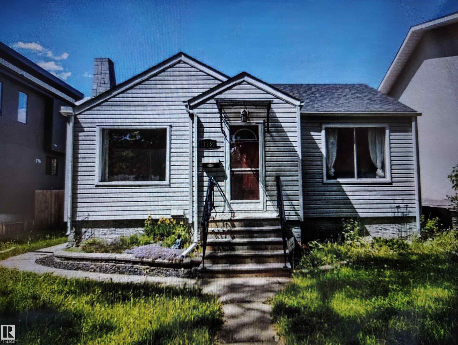 Property Photo:  11730 125 Street NW  AB T5M 0N6 