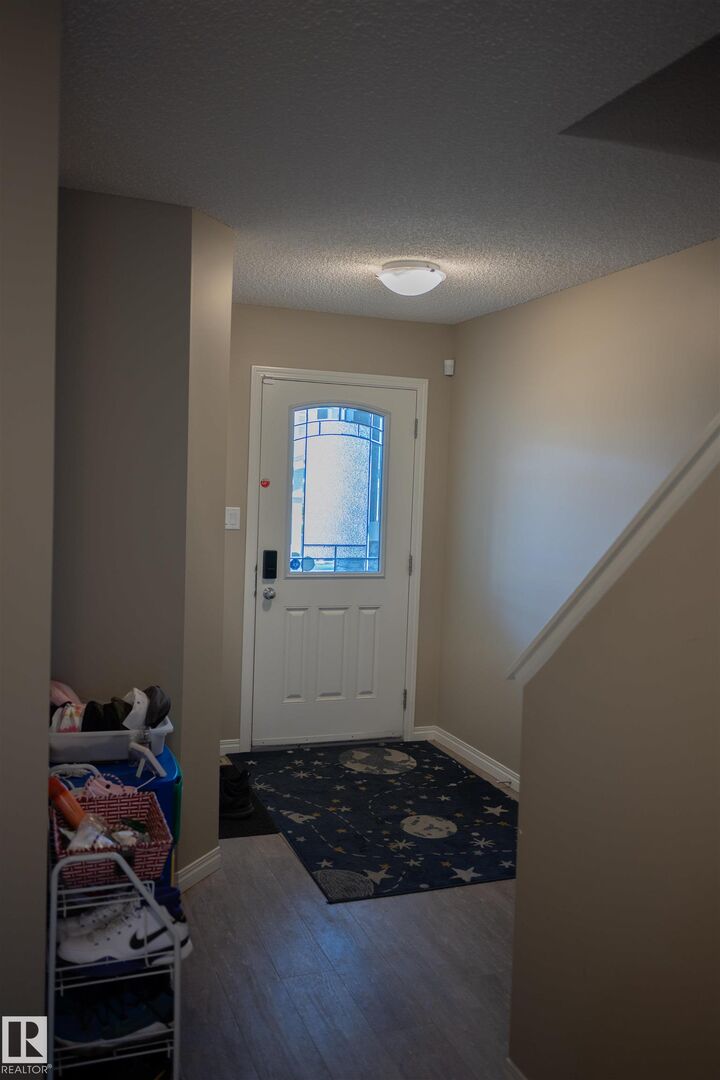 Property Photo:  9014 Cooper Link Link SW  AB T6W 4A5 