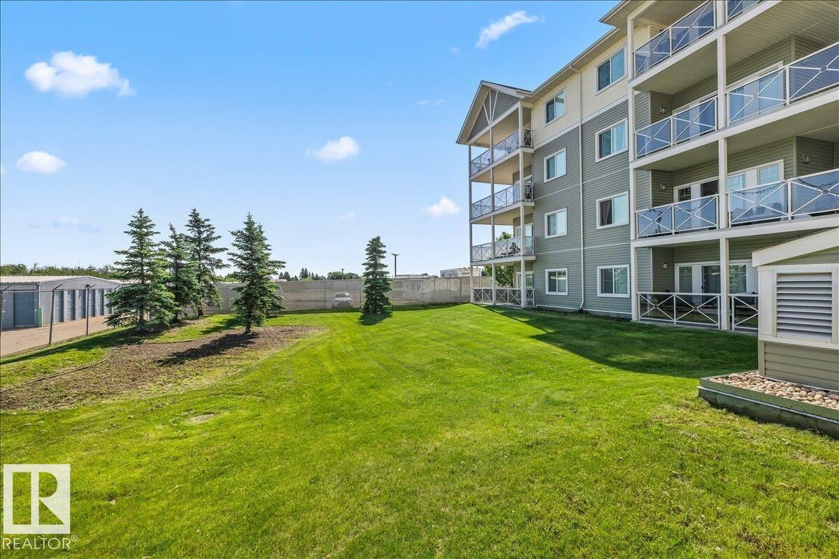 Property Photo:  12660 142 Avenue NW 114  AB T5X 0J5 