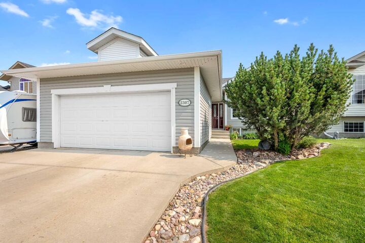 Property Photo:  2307 61A Avenue  AB T9V 3J8 