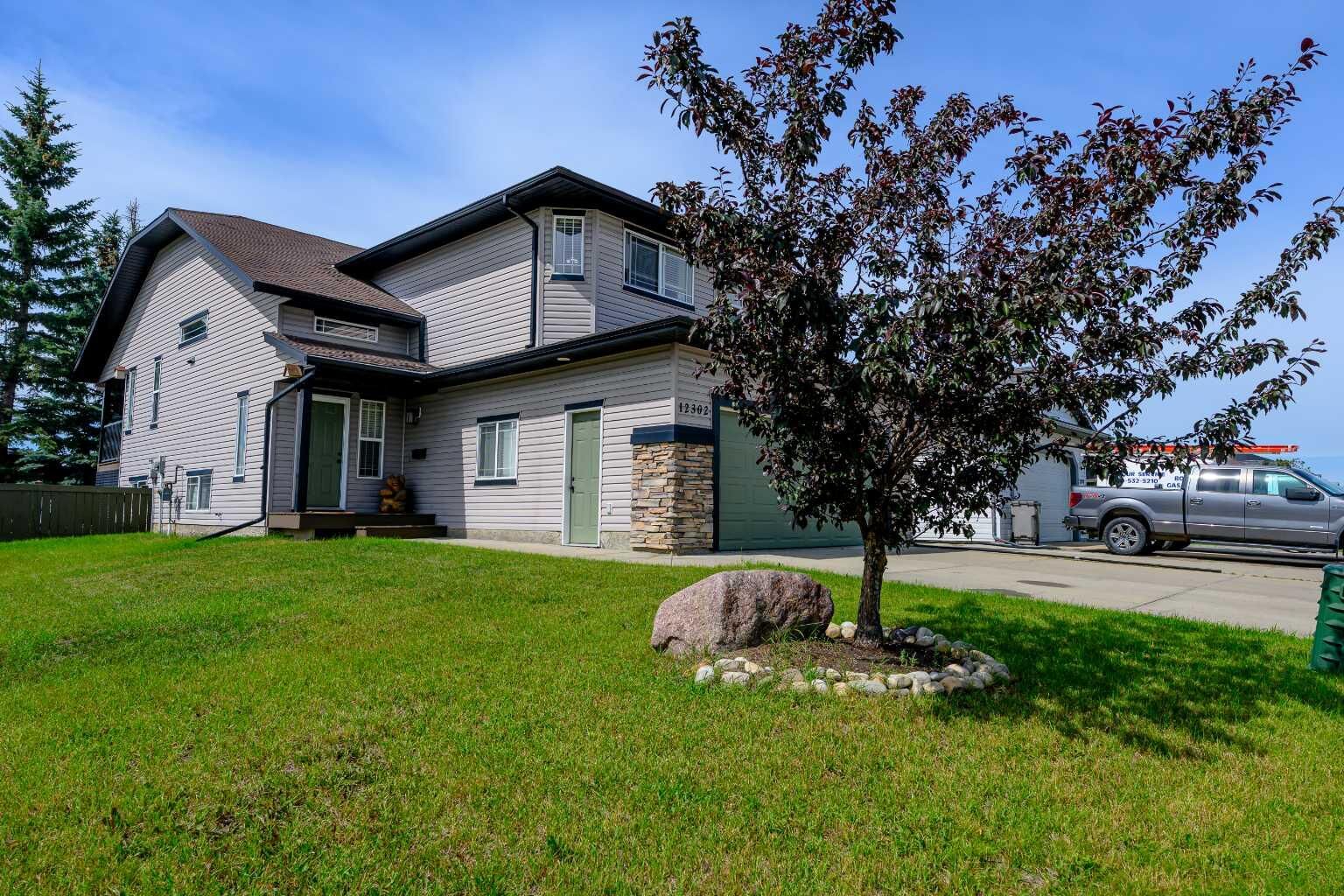 Property Photo:  12302 107A Street  AB T8V 4X1 