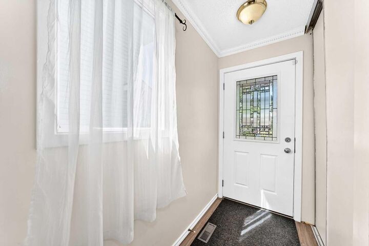 Property Photo: 312 Falton Drive NE AB T3J 2X1