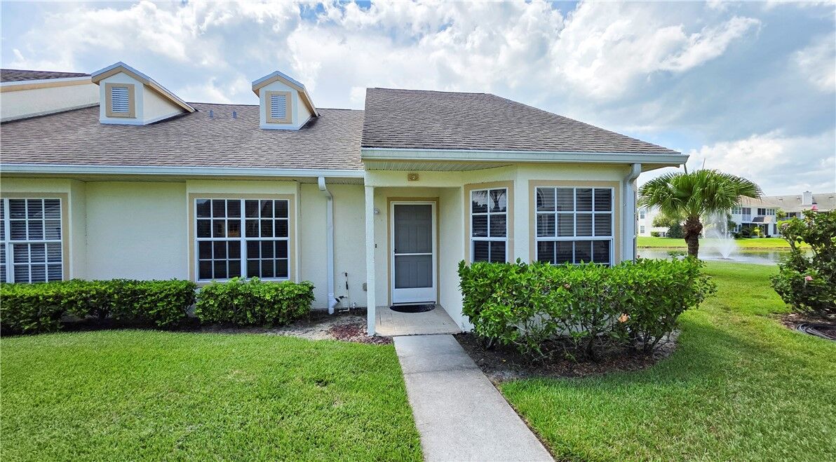 Property Photo:  1827 Aynsley Way 2-27  FL 32966 