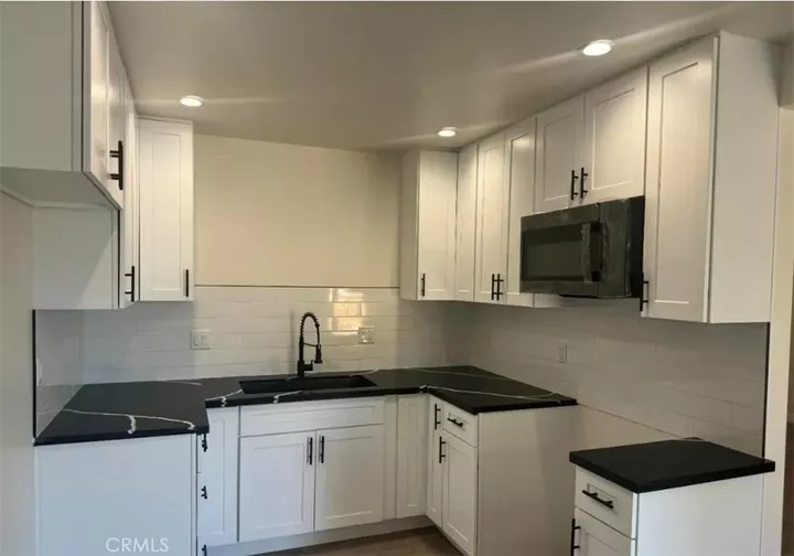 Property Photo:  336 T  CA 93304 