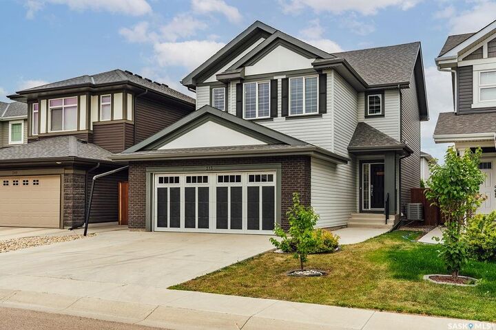 Property Photo: 213 Dubois Crescent SK S7V 0R4