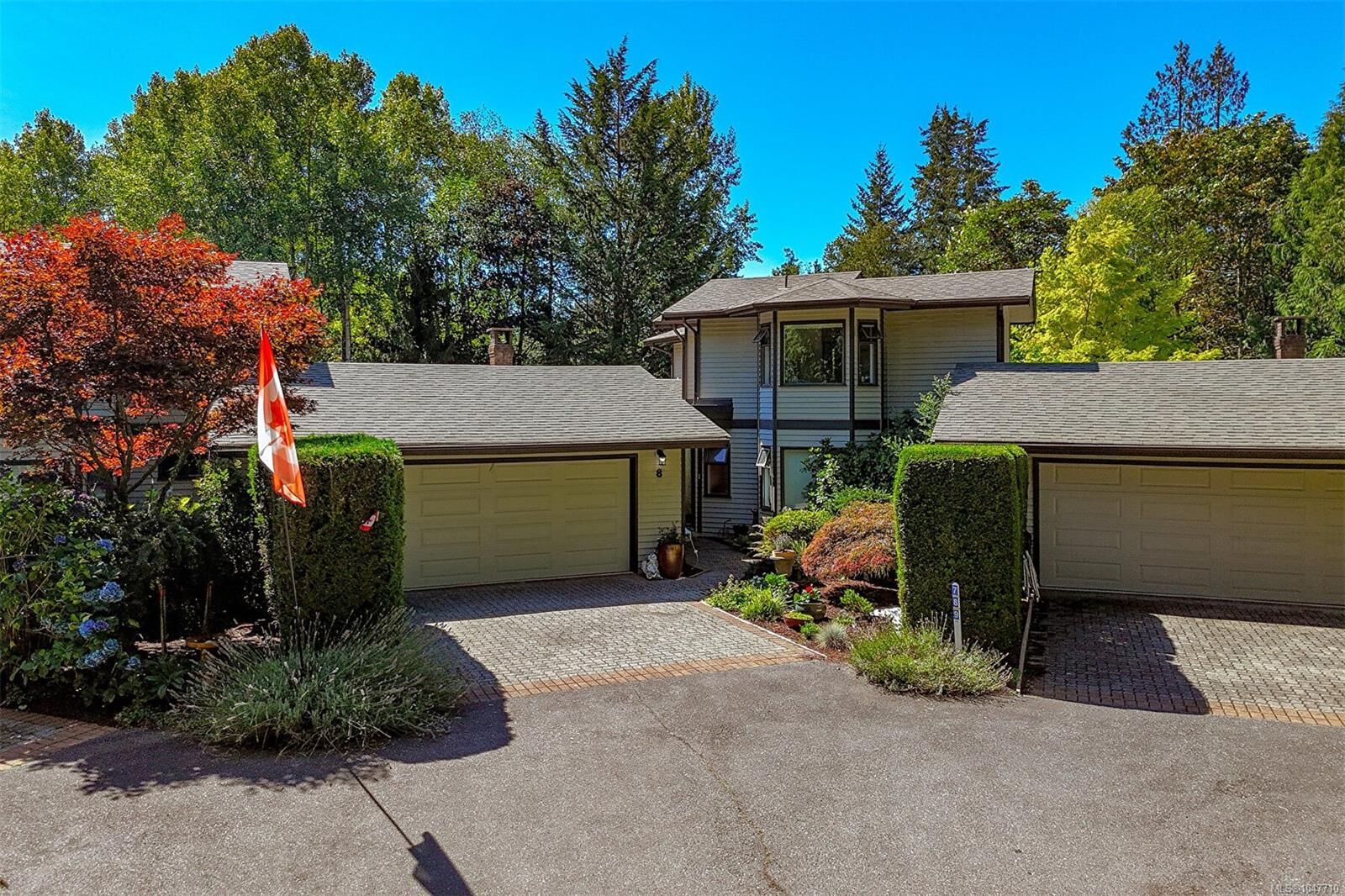 Property Photo:  1255 Wain Rd #8  BC V8L 4R4 