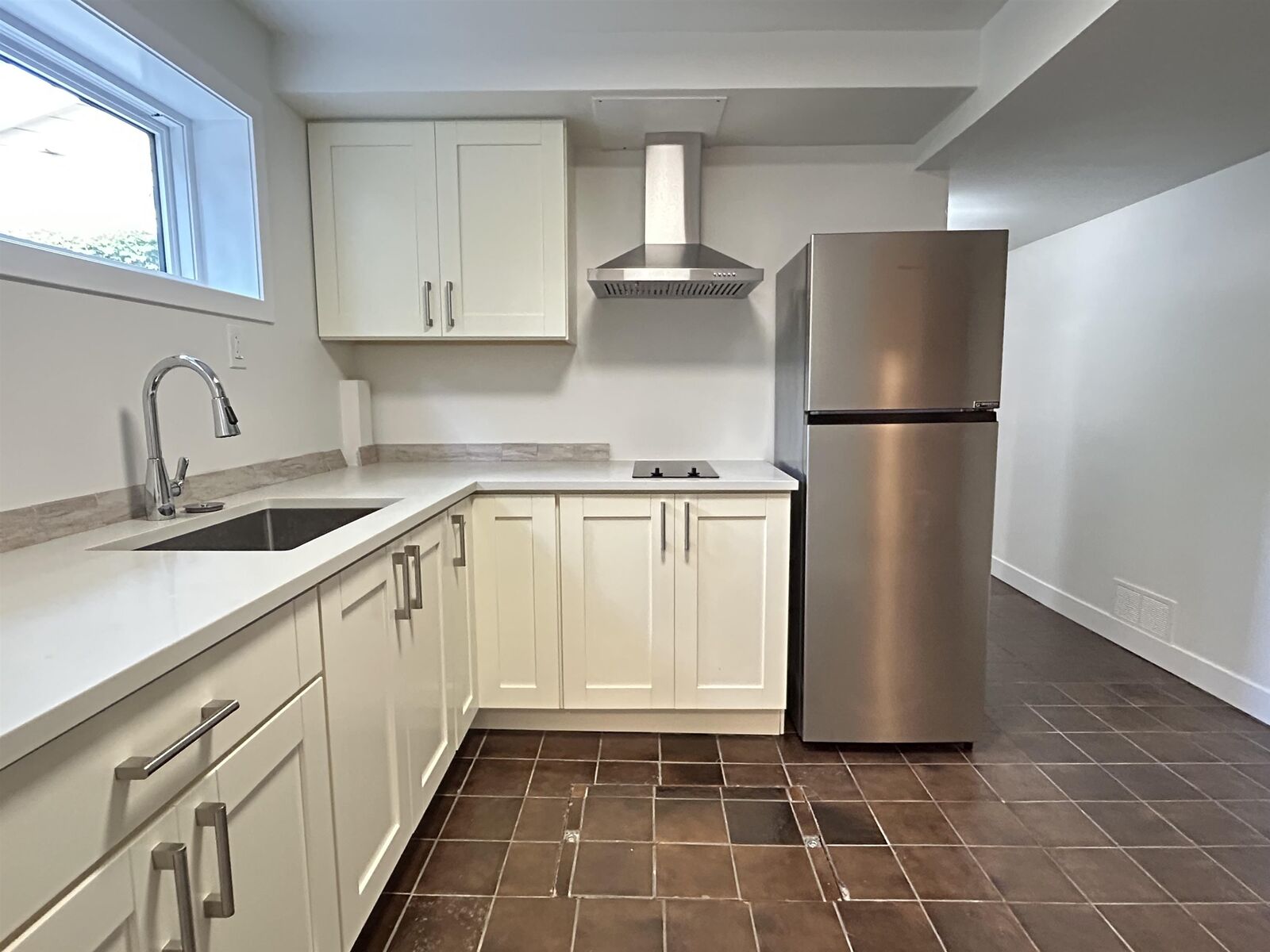 Property Photo:  4769 Haggart Street Basement  BC V6L 2H7 