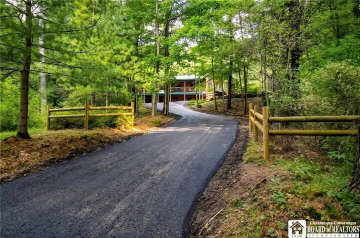 Property Photo:  12990 Guernsey Hollow Road  NY 14738 
