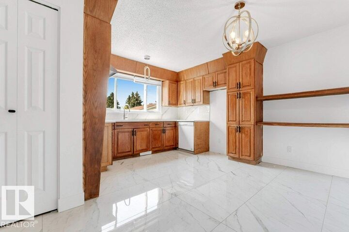 Property Photo: 632 Knottwood Road NW AB T6K 1W8