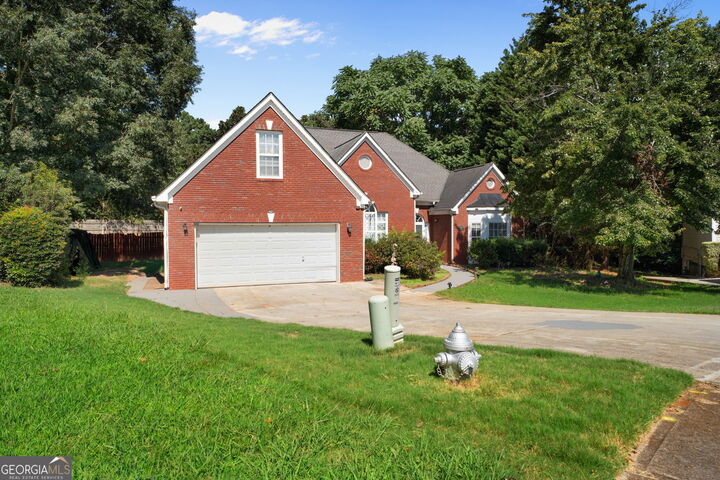 Property Photo:  1000 Georgian Hills Dr  GA 30045 