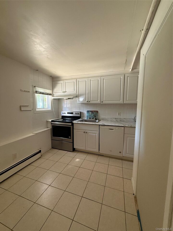 Property Photo:  32 Jefferson Avenue  NY 11729 