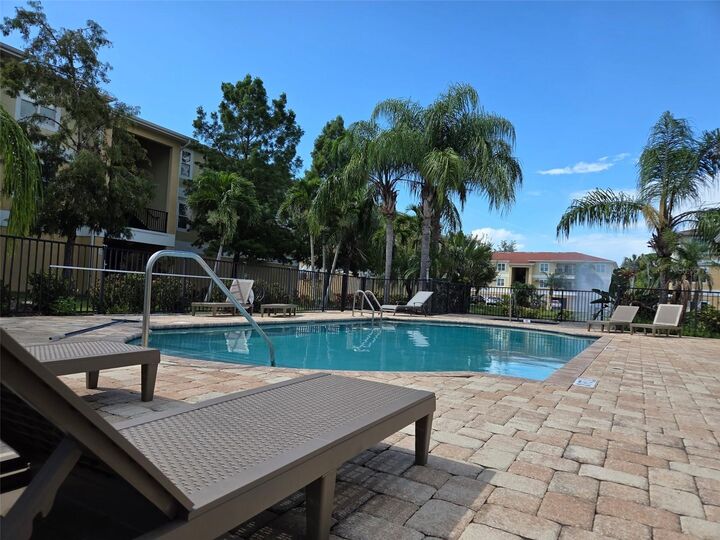 Property Photo:  5111 Royal Palms Way 202  FL 34652 