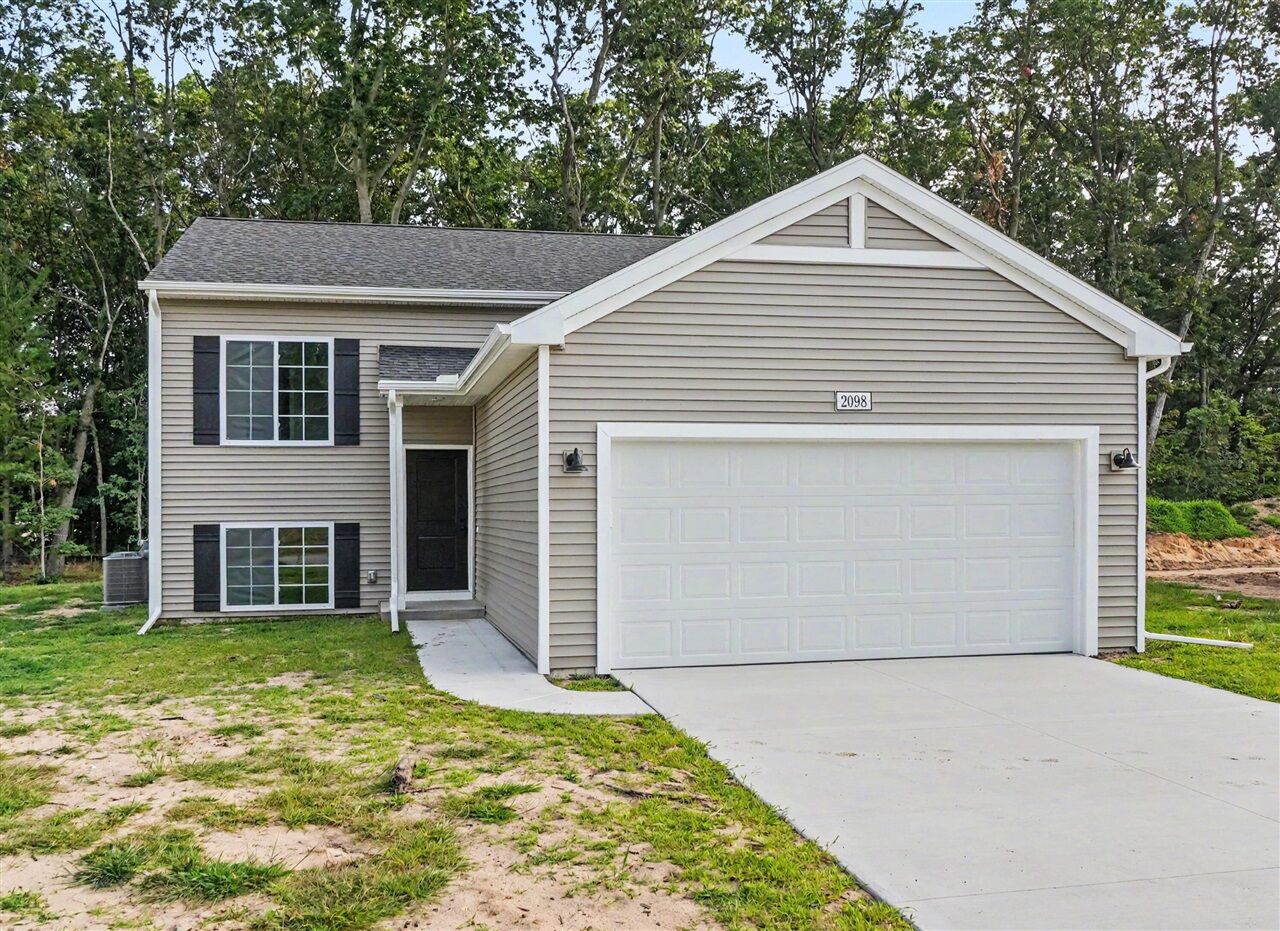Property Photo: 2098 Kristin Court MI 49442-1458