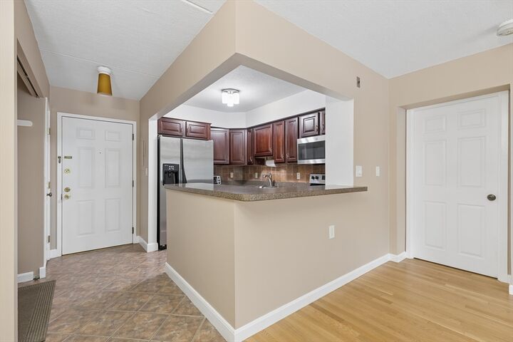 Property Photo:  4975 Washington St 209  MA 02132 