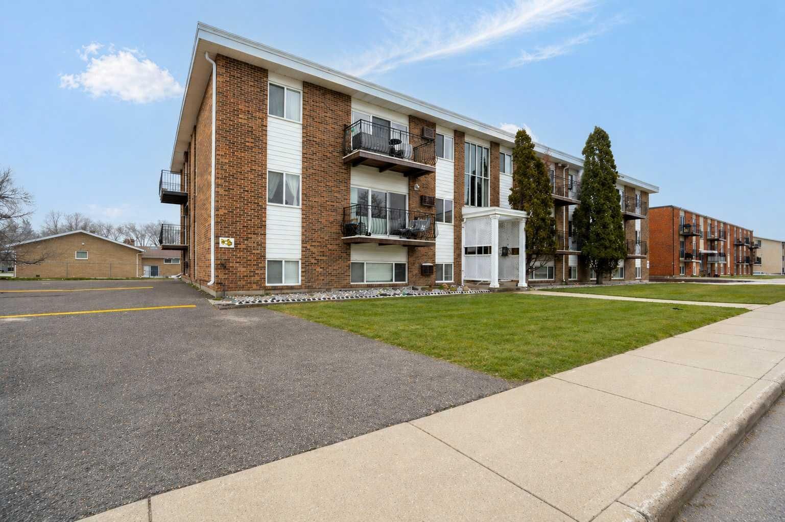 Property Photo:  663 12 Street NW 210  AB T1A 7M1 