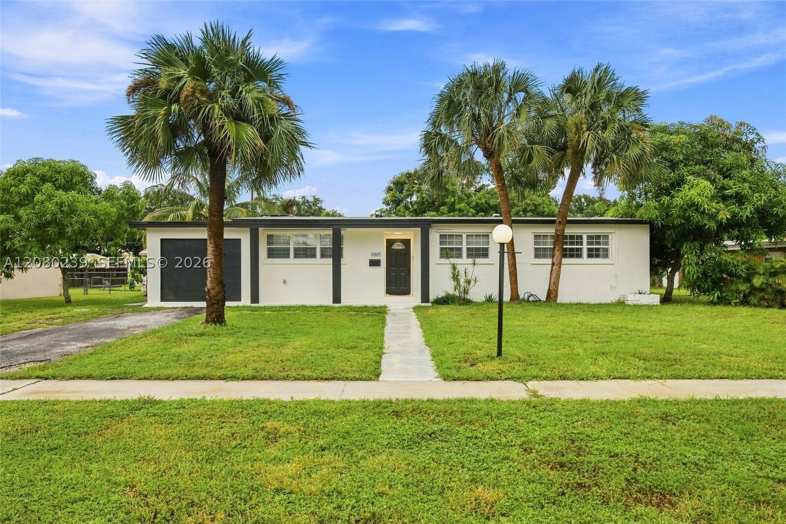 Property Photo:  6885 NW 14th Ct  FL 33313 
