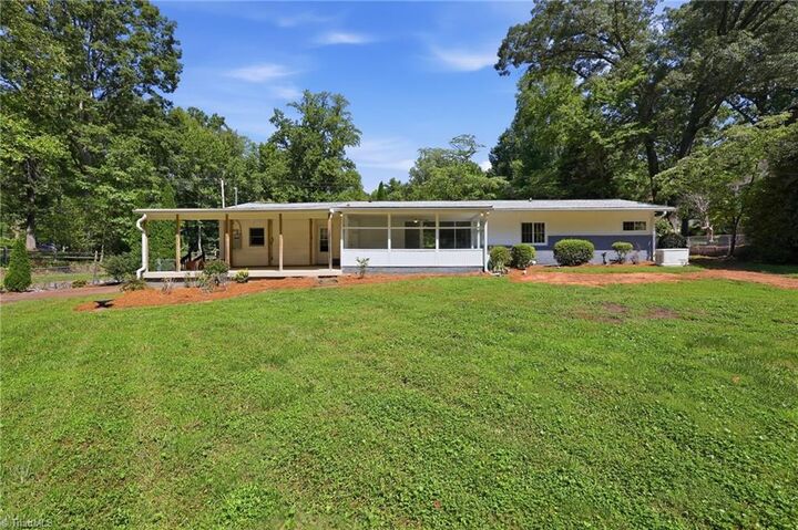 Property Photo:  204 Pineburr Road  NC 27455 